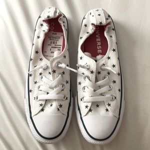 White converse with blue stars